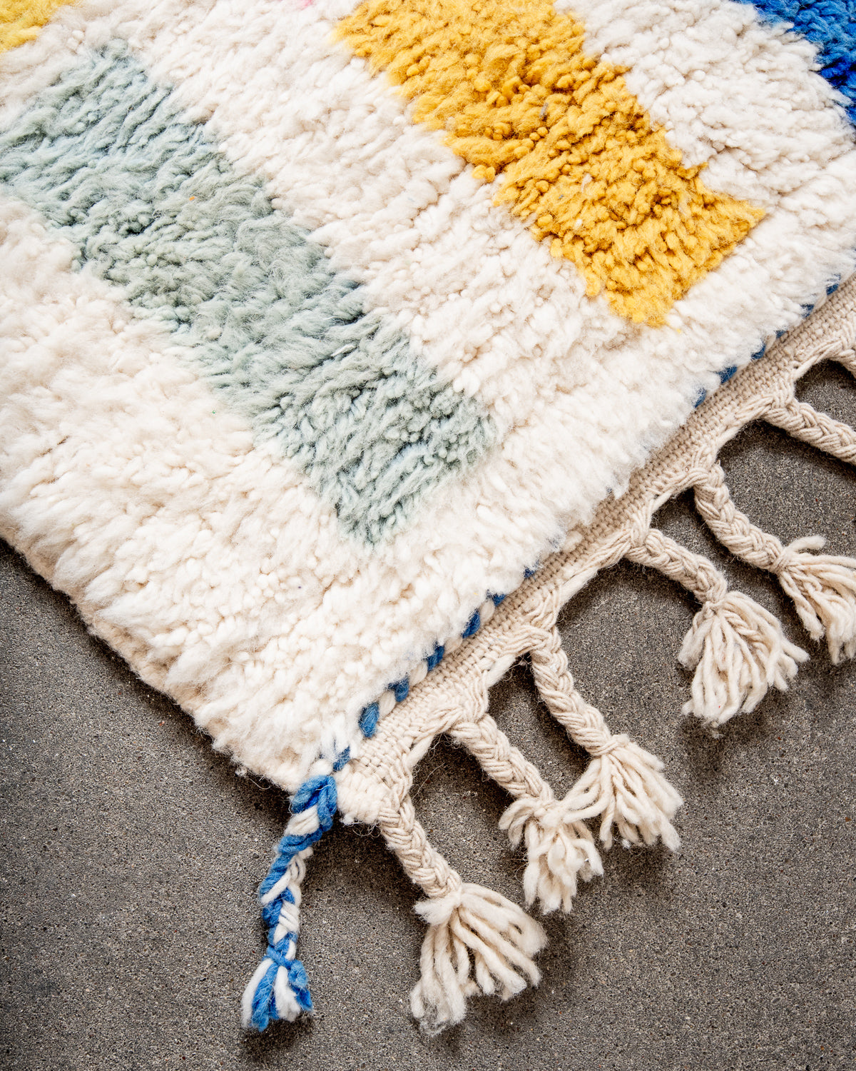 Modern, designer, handcrafted Berber rug from Morocco. Beniourain carpet with beautiful colours and patterns and fluffy wool texture.